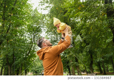 Father and Baby Enjoying a Day in the Park Father and Baby Enjoying a Day in the Park 131384987