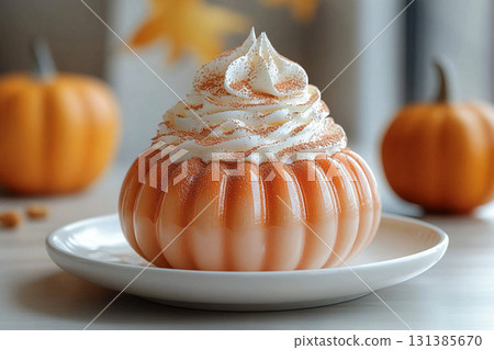 Trending food and party. Pumpkin dessert in orange tones on a plate with soft lighting. Preparing for Halloween. Autumn atmosphere. Trending food and party. Pumpkin dessert in orange tones on a plate with soft lighting. Preparing for Halloween. Autumn atmosphere. 131385670