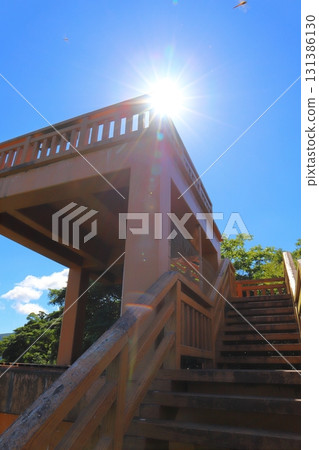 Observation deck, stairs, sun, blue sky, trees Observation deck, stairs, sun, blue sky, trees 131386130