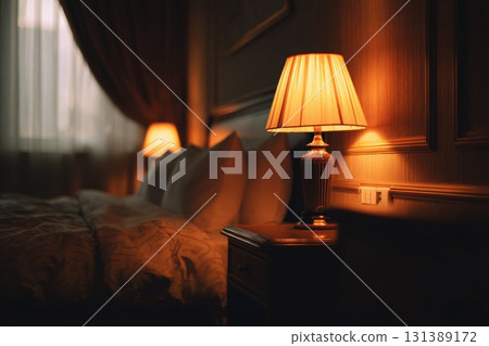 Cozy bedroom with warm lighting and inviting atmosphere for sleep tourism experience 131389172