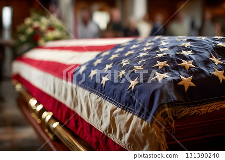 United States flag draped over a coffin at a solemn ceremony 131390240