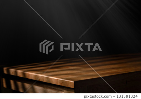 Wooden tabletop with dramatic light and shadow 131391324