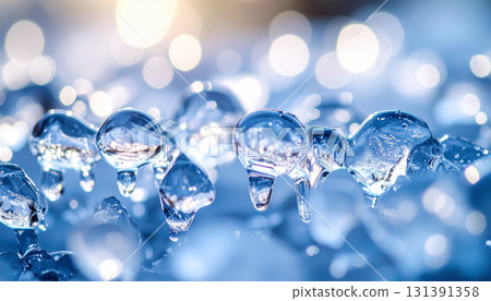Crystal clear details of melting ice dripping with water droplets Crystal clear details of melting ice dripping with water droplets 131391358