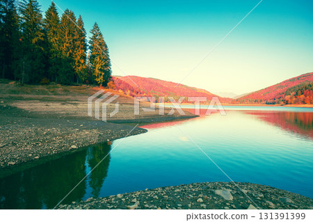Beautiful mountain lake with reflection in autumn 131391399