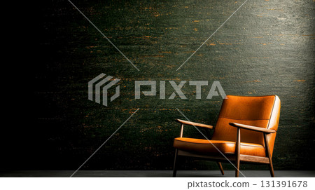 Stylish Mid-Century Armchair with Rich Brown Leather against Dark Textured Wall 131391678