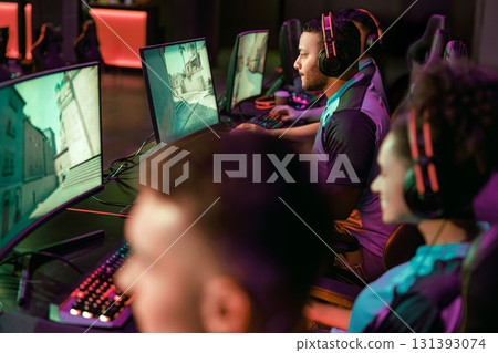 A highly skilled Competitive Gaming Team in action during an exciting ESports Event A highly skilled Competitive Gaming Team in action during an exciting ESports Event 131393074