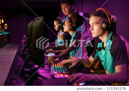 Competitive Gamers in Full Action Display at the Thrilling Esports Tournament Event Competitive Gamers in Full Action Display at the Thrilling Esports Tournament Event 131393176