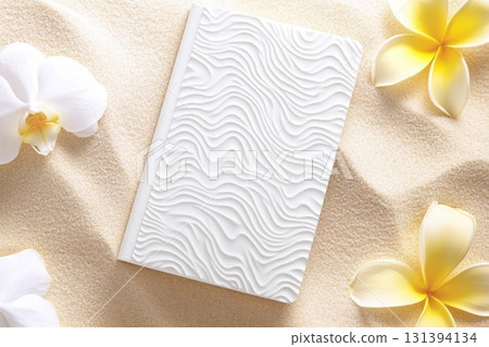 Minimalist design mockup showcasing a blank white book placed on a soft sand-colored background with delicate flowers around it, perfect for creative projects Minimalist design mockup showcasing a blank white book placed on a soft sand-colored background with delicate flowers around it, perfect for creative projects 131394134