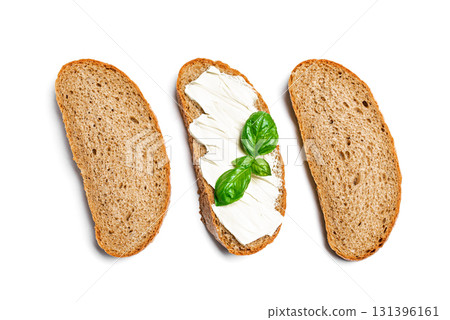 Bread with butter and slices of bread on white 131396161