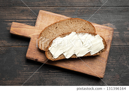 Slices of sourdough with organic butter Slices of sourdough with organic butter 131396164