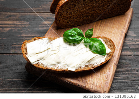 Slices of sourdough with organic butter Slices of sourdough with organic butter 131396168