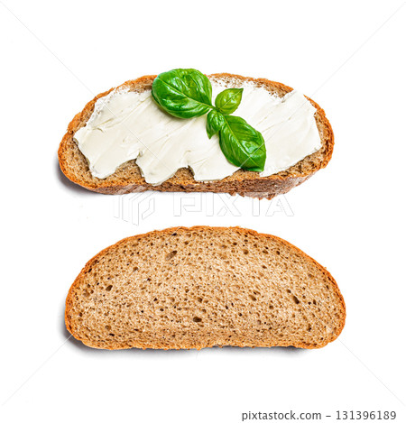 Bread with butter and slice of bread on white 131396189