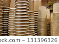 Brown Kraft Two Layer Cups Stacked Upside Down On A Shelf At Coffee Shop 131396326