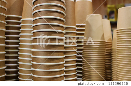 Brown Kraft Two Layer Cups Stacked Upside Down On A Shelf At Coffee Shop 131396326