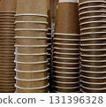 Brown Disposable Coffee Cups Stacked In A Columns  131396328