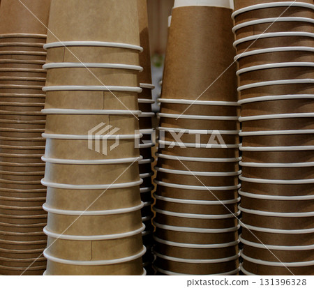Brown Disposable Coffee Cups Stacked In A Columns Brown Disposable Coffee Cups Stacked In A Columns 131396328