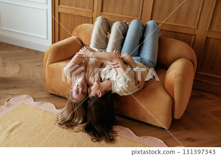 Best friends. Two happy young women are indoors 131397343