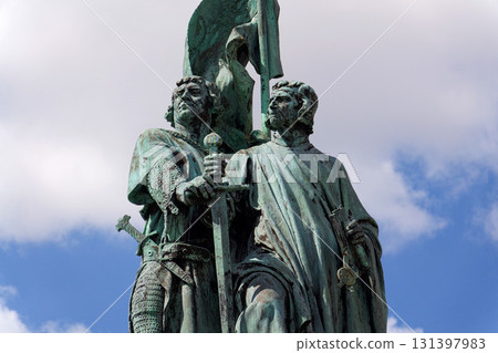 Jan Breydel and Pieter de Coninck monument in Bruges, Belgium, statue of the two popular local heroes who played a major role in the Flemish resistance against the French king Jan Breydel and Pieter de Coninck monument in Bruges, Belgium, statue of the two popular local heroes who played a major role in the Flemish resistance against the French king 131397983