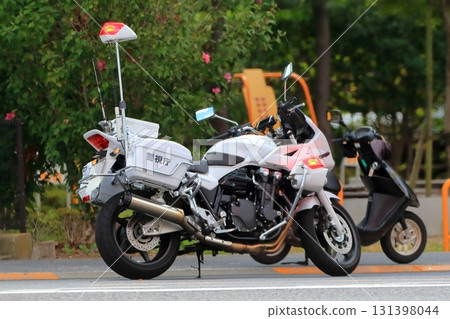 A police motorcycle on patrol A police motorcycle on patrol 131398044