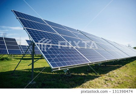 Photovoltaic solar panels outdoors under sunlight 131398474