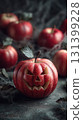Creative Halloween decoration with carved apple 131399228