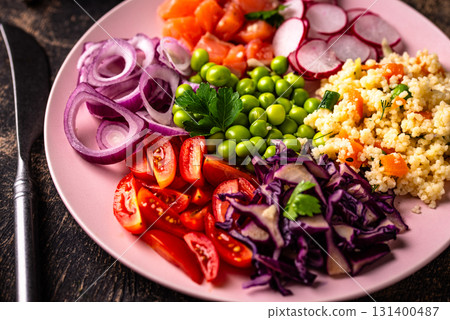 Balanced healthy bowl with vegetables and salmon 131400487