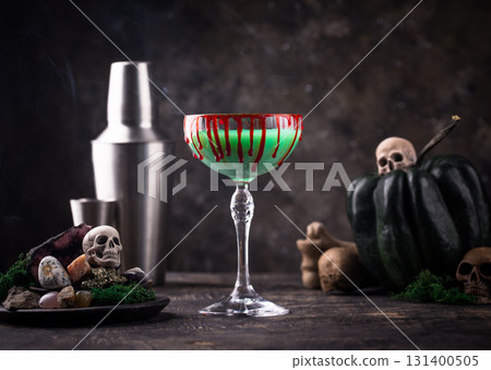 Halloween green zombie martini cocktail Halloween green zombie martini cocktail 131400505