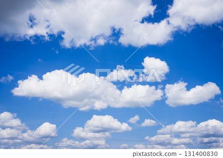 Beautiful white fluffy clouds in deep-blue sky 131400830