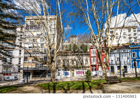 Walking along the streets in historic Coimbra, Portugal's most important university town and old capital. Baixa streets in medieval quarter. 131400981