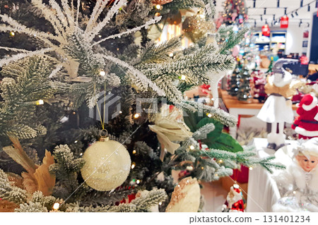 Christmas decoration tree in the shop, winter street market indoor Christmas decoration tree in the shop, winter street market indoor 131401234