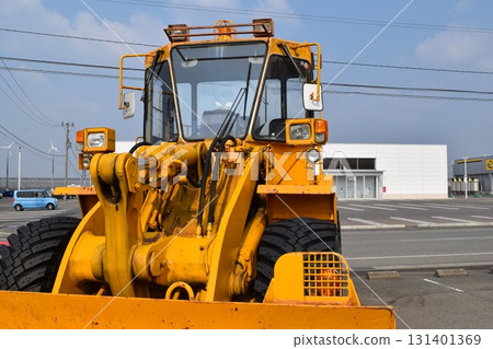 Snowplow waiting in a snowy country Snowplow waiting in a snowy country 131401369
