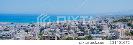 Panoramic view of the Greek city of Rethymno from a height on the island of Crete Greece. Residential buildings and the Aegean sea 131401672