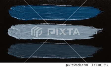 colorful oil paint strokes in a row on black background 131401937