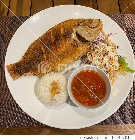 Fried Fish with Rice, Sauce and Vegetable Salad Fried Fish with Rice, Sauce and Vegetable Salad 131402013