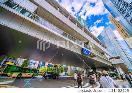 Tokyo cityscape in Japan, including the intersection in front of Shimbashi Station and the office buildings in Shiodome 131402396