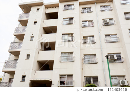 The exterior of an old housing complex. Housing conditions in Japan The exterior of an old housing complex. Housing conditions in Japan 131403636
