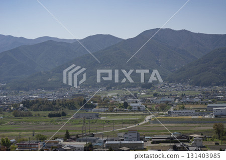 Spring view of Tatsuno Town, Kamiina County, Nagano Prefecture from a high vantage point Spring view of Tatsuno Town, Kamiina County, Nagano Prefecture from a high vantage point 131403985