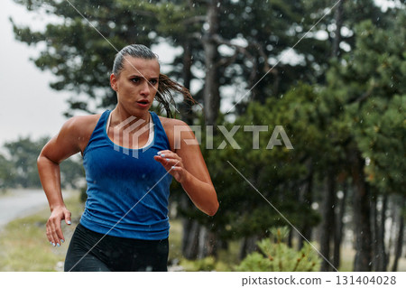 Unstoppable: A Determined Athlete Trains Through the Rain in Pursuit of Marathon Glory Unstoppable: A Determined Athlete Trains Through the Rain in Pursuit of Marathon Glory 131404028