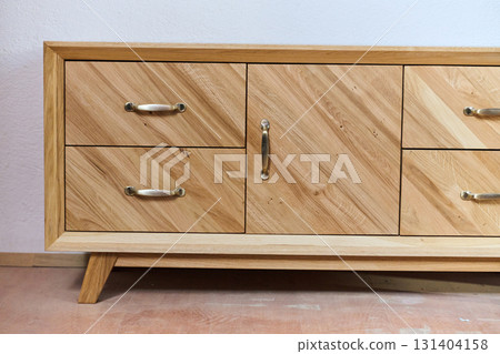 Close-Up of Finished Wooden Products Table and Sideboard 131404158