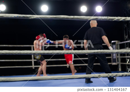 Fierce boxing match showcases athletes' power and skill. Fierce boxing match showcases athletes' power and skill. 131404167