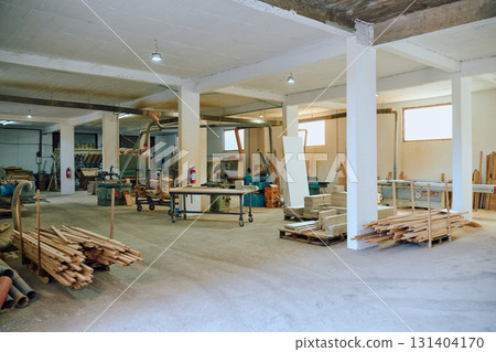 Interior of Wood Processing Industry Featuring CNC Cutting Machines and Wood Processing Equipment Interior of Wood Processing Industry Featuring CNC Cutting Machines and Wood Processing Equipment 131404170