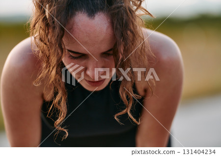 Woman Resting After Intense Run 131404234