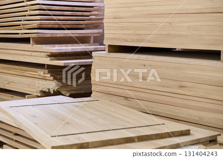 Wooden Parts and Boards Stored in Warehouse Ready for CNC Machine Processing 131404243