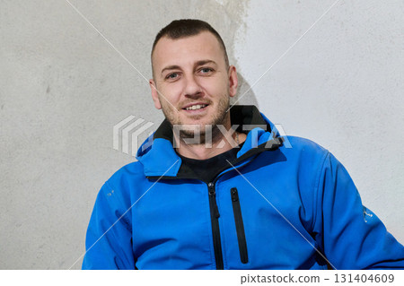 Close Up of Worker Carefully Cutting and Planing Wooden Pieces for Furniture in Wood Industry 131404609
