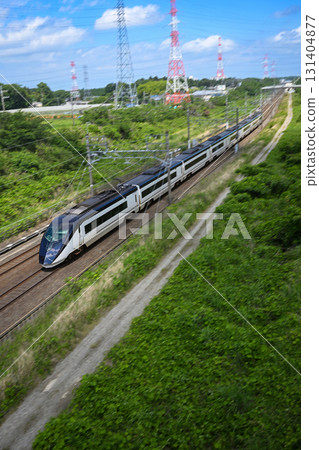 Keisei Skyliner speeding along the Narita Sky Access Line Keisei Skyliner speeding along the Narita Sky Access Line 131404877