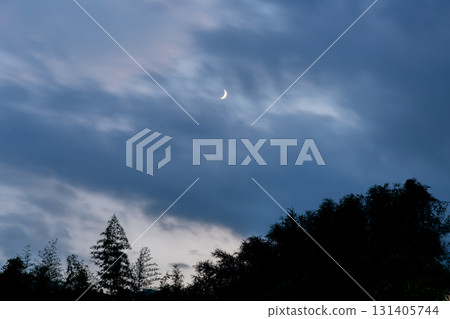 Moon and sunset sky 131405744