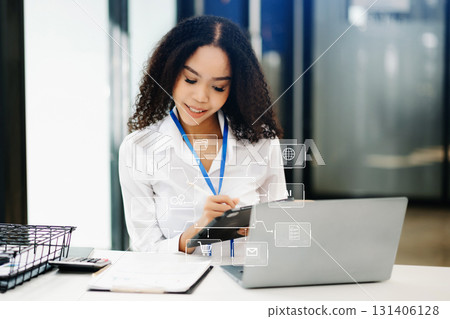 businesswoman hand working with mobile phone and modern compute with VR icon businesswoman hand working with mobile phone and modern compute with VR icon 131406128