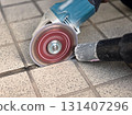 Outdoor floor tile grout cutter construction photo 01 131407296