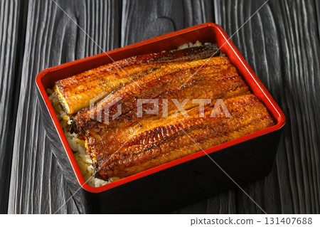 Eel and rice in a lacquered box Eel and rice in a lacquered box 131407688