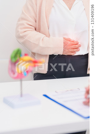 Elderly Patient consultation with doctor for Pancreas, Gallbladder, Bile Duct, Duodenum, Small intestine. Pancreatic cancer, Acute and Chronic pancreatitis, Digestive system and medical healthcare 131409196